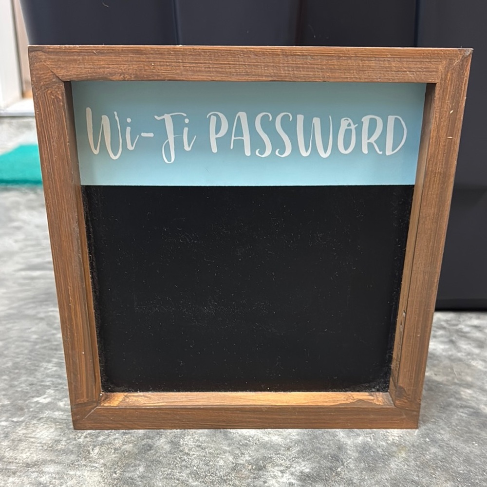 Kirklands. “WiFi Password” wooden sign.